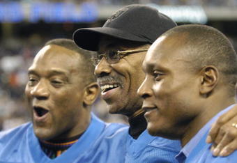 Detroit Lions running backs Billy Simms and Barry Sanders flank Lem Barney before play against  the Indianapolis Colts in a Thanksgiving Day game, November 25, 2005 in Detroit.  The Colts defeated the Lions 41 to 9.  (Photo by Al Messerschmidt/Getty Images)