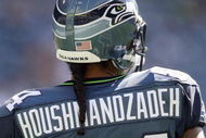 SEATTLE , WA - SEPTEMBER 13:  T.J. Houshmandzadeh #84 of the Seattle Seahawks looks on the field before the game against the St. Louis Rams at Qwest Field on September 13, 2009 in Seattle, Washington. (Photo by Otto Greule Jr/Getty Images)