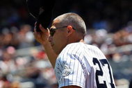 NEW YORK - JULY 19:  New York Yankee manager Joe Girardi is introduced during the teams 63rd Old Timers Day before the game against the Detroit Tigers on July 19, 2009 at Yankee Stadium in the Bronx borough of New York City.  (Photo by Jim McIsaac/Getty Images)