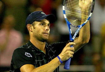 MONTREAL, QC - AUGUST 14:  Andy Roddick of the United States celebrates his win over Novak Djokovic of Serbia after their match during the quarterfinals of the Rogers Cup at Uniprix Stadium on August 14, 2009 in Montreal, Canada.  (Photo by Matthew Stockman/Getty Images)