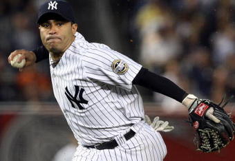 NEW YORK - SEPTEMBER 08:  Jerry Hairston Jr. #17 of the New York Yankees throws to first base against the Tampa Bay Rays on September 8, 2009 at Yankee Stadium in the Bronx borough of New York City.  (Photo by Jim McIsaac/Getty Images)