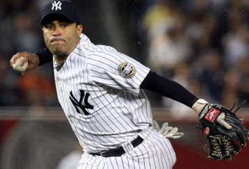 NEW YORK - SEPTEMBER 08:  Jerry Hairston Jr. #17 of the New York Yankees throws to first base against the Tampa Bay Rays on September 8, 2009 at Yankee Stadium in the Bronx borough of New York City.  (Photo by Jim McIsaac/Getty Images)