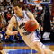 PHILADELPHIA - MARCH 19: Jimmer Fredette #32 of the Brigham Young Cougars drives against Dash Harris #5 of the Texas A&M Aggies during the first round of the NCAA Division I Men's Basketball Tournament at the Wachovia Center on March 19, 2009 in Philadelphia, Pennsylvania. (Photo by Jim McIsaac/Getty Images)