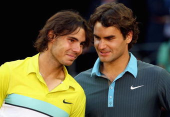 MADRID, SPAIN - MAY 17:  Roger Federer of Switzerland (R) and Rafael Nadal of Spain share a moment during the prize giving ceremony after the mens final during the Madrid Open tennis tournament at the Caja Magica on May 17, 2009 in Madrid, Spain.  (Photo by Clive Brunskill/Getty Images)