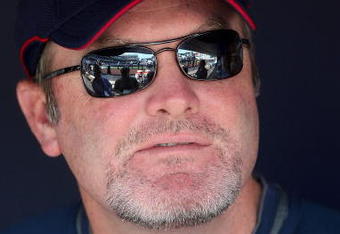 NEW YORK - APRIL 18:  Manager of the Cleveland Indians, Eric Wedge in the dugout during batting practice prior to the game against the New York Yankees at Yankee Stadium on April 18, 2009 in the Bronx borough of New York City.  (Photo by Nick Laham/Getty Images)