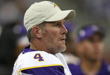 DETROIT - SEPTEMBER 20:  Quarterback Brett Favre #4 of the Minnesota Vikings looks on from the bench in the game against the Detroit Lions at Ford Field on September 20, 2009 in Detroit, Michigan. The Vikings won 27-13.  (Photo by Stephen Dunn/Getty Images)