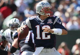 EAST RUTHERFORD, NJ - SEPTEMBER 20:  Tom Brady #12 of the New England Patriots throws a pass against the New York Jets at Giants Stadium on September 20, 2009 in East Rutherford, New Jersey.  (Photo by Nick Laham/Getty Images)