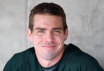 TEMPE, AZ - MARCH 08:  Matt Carson #23 of the Oakland Athletics smiles in the dugout before the spring training game against the Cleveland Indians at Phoenix Municipal Stadium on March 8, 2009 in Tempe, Arizona. The A's defeated the Indians 8-5. (Photo by Christian Petersen/Getty Images)