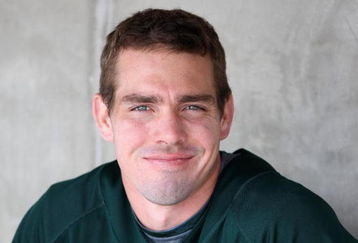 TEMPE, AZ - MARCH 08:  Matt Carson #23 of the Oakland Athletics smiles in the dugout before the spring training game against the Cleveland Indians at Phoenix Municipal Stadium on March 8, 2009 in Tempe, Arizona. The A's defeated the Indians 8-5. (Photo by Christian Petersen/Getty Images)