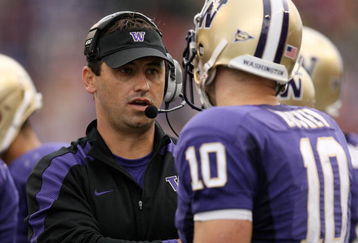 SEATTLE - SEPTEMBER 19:  Head coach Steve Sarkisian of the Washington Huskies talks with quarterback Jake Locker #10 during the game against the USC Trojans on September 19, 2009 at Husky Stadium in Seattle, Washington. The Huskies defeated the Trojans 16-13. (Photo by Otto Greule Jr/Getty Images)