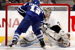 TORONTO - SEPTEMBER 22:  Lee Stempniak #12 of the Toronto Maple Leafs scores on John Curry #36 of the Pittsburgh Penguins in the shoot-out during a pre-season  NHL game at the Air Canada Centre on September 22, 2009 in Toronto, Ontario, Canada .  (Photo by Abelimages/Getty Images)