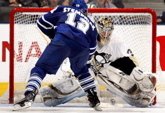 TORONTO - SEPTEMBER 22:  Lee Stempniak #12 of the Toronto Maple Leafs scores on John Curry #36 of the Pittsburgh Penguins in the shoot-out during a pre-season  NHL game at the Air Canada Centre on September 22, 2009 in Toronto, Ontario, Canada .  (Photo by Abelimages/Getty Images)