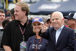 LOUDON, NH - SEPTEMBER 14:  (L-R) Curt Schilling, Shonda Schilling stand by as republican presidential candidate John McCain waves to fans with his wife Cindy McCain before the start of the NASCAR Sprint Cup Series Sylvania 300 at New Hampshire Motor Speedway on September 14, 2008 in Loudon, New Hampshire.  (Photo by Elsa/Getty Images)