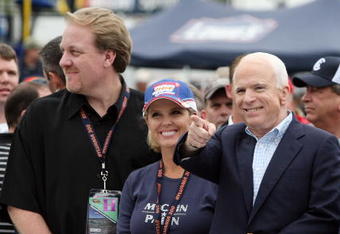 LOUDON, NH - SEPTEMBER 14:  (L-R) Curt Schilling, Shonda Schilling stand by as republican presidential candidate John McCain waves to fans with his wife Cindy McCain before the start of the NASCAR Sprint Cup Series Sylvania 300 at New Hampshire Motor Speedway on September 14, 2008 in Loudon, New Hampshire.  (Photo by Elsa/Getty Images)