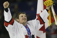 24 Feb 2002: Theo Fleury #74 of Canada celebrates after defeating the USA 5-2 in the mens ice hockey gold medal game of the Salt Lake City Winter Olympic Games at the E Center in Salt Lake City, Utah. DIGITAL IMAGE. Mandatory Credit: Brian Bahr/Getty Images