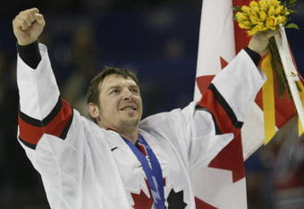 24 Feb 2002:  Theo Fleury #74 of Canada celebrates after defeating the USA 5-2 in the mens ice hockey gold medal game of the Salt Lake City Winter Olympic Games at the E Center in Salt Lake City, Utah. DIGITAL IMAGE. Mandatory Credit:  Brian Bahr/Getty Images