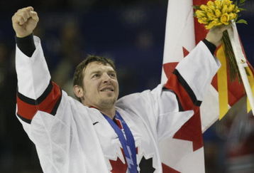 24 Feb 2002:  Theo Fleury #74 of Canada celebrates after defeating the USA 5-2 in the mens ice hockey gold medal game of the Salt Lake City Winter Olympic Games at the E Center in Salt Lake City, Utah. DIGITAL IMAGE. Mandatory Credit:  Brian Bahr/Getty Images