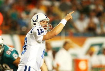 MIAMI - SEPTEMBER 21:  Quarterback Peyton Manning #18 of the Indianapolis Colts points out to his wide receiver against the Miami Dolphins at Land Shark Stadium on September 21, 2009 in Miami, Florida. The Colts defeated the Dolphins 27-23.  (Photo by Doug Benc/Getty Images)