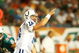 MIAMI - SEPTEMBER 21:  Quarterback Peyton Manning #18 of the Indianapolis Colts points out to his wide receiver against the Miami Dolphins at Land Shark Stadium on September 21, 2009 in Miami, Florida. The Colts defeated the Dolphins 27-23.  (Photo by Doug Benc/Getty Images)