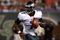 EAST RUTHERFORD, NJ - SEPTEMBER 03:  Michael Vick #7 of the Philadelphia Eagles looks to throw a pass against the New York Jets on September 3, 2009 at Giants Stadium in East Rutherford, New Jersey. The Jets defeated the Eagles 38-27.  (Photo by Jim McIsaac/Getty Images)