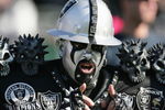 OAKLAND, CA - DECEMBER 19:  A fan of the Oakland Raiders cheers during the game against the Tennessee Titans at Network Associates Coliseum on December 19, 2004 in Oakland, California. (Photo by Jed Jacobsohn/Getty Images)