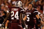 COLUMBIA, SC - SEPTEMBER 24:  Stephen Garcia #5 of the South Carolina Gamecocks celebrates with teammate Darian Stewart #24 after a 16-10 vicotry over the Ole Miss Rebels during their game at Williams-Brice Stadium on September 24, 2009 in Columbia, South Carolina.  (Photo by Streeter Lecka/Getty Images)
