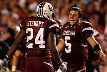 COLUMBIA, SC - SEPTEMBER 24:  Stephen Garcia #5 of the South Carolina Gamecocks celebrates with teammate Darian Stewart #24 after a 16-10 vicotry over the Ole Miss Rebels during their game at Williams-Brice Stadium on September 24, 2009 in Columbia, South Carolina.  (Photo by Streeter Lecka/Getty Images)