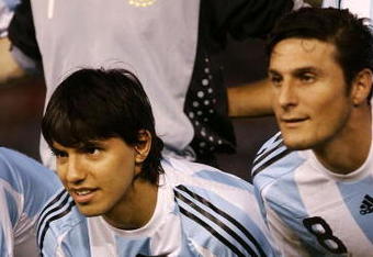BUENOS AIRES, ARGENTINA - MARCH 28: Sergio Aguero of Argentina poses for photographs with his son Benjamin prior to the 2010 FIFA World Cup South African qualifier match between Argentina and Venezuela at River Plate Stadium on March 28, 2009 in Buenos Aires, Argentina. (Photo by Photogamma/Getty Images)
