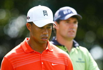 ATLANTA - SEPTEMBER 25:  Tiger Woods walks alongside Padraig Harrington of Ireland on the eighth hole during the second round of THE TOUR Championship presented by Coca-Cola, the final event of the PGA TOUR Playoffs for the FedEx Cup, at East Lake Golf Club on September 25, 2009 in Atlanta, Georgia.  (Photo by Scott Halleran/Getty Images)