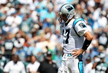 CHARLOTTE, NC - SEPTEMBER 13:  Quarterback Jake Delhomme #17 of the Carolina Panthers stands on the field in the second half of the NFL season opener against the Philadelphia Eagles at Bank of America Stadium on September 13, 2009 in Charlotte, North Carolina.  (Photo by Streeter Lecka/Getty Images)