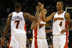 OAKLAND, CA - NOVEMBER 07:  Kelenna Azubuike #7, Marcus Williams #5 and Anthony Randolph #4 of the Golden State Warriors celebrate against the Memphis Grizzlies during an NBA game on November 7, 2008 at Oracle Arena in Oakland, California. NOTE TO USER: User expressly acknowledges and agrees that, by downloading and or using this photograph, User is consenting to the terms and conditions of the Getty Images License Agreement.  (Photo by Jed Jacobsohn/Getty Images)