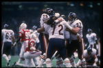 26 Jan 1986: The Chicago Bears celebrate after defensive lineman William Perry scores a touchdown during Super Bowl XX against the New England Patriots at the Superdome in New Orleans, Louisiana. The Bears won the game, 46-10.