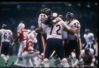 26 Jan 1986: The Chicago Bears celebrate after defensive lineman William Perry scores a touchdown during Super Bowl XX against the New England Patriots at the Superdome in New Orleans, Louisiana. The Bears won the game, 46-10.