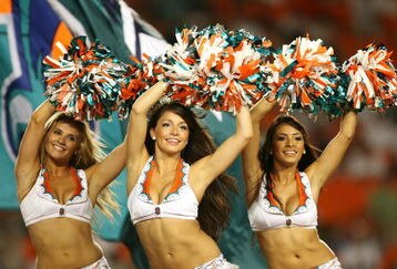 MIAMI - SEPTEMBER 21:  Cheerleaders perform along with parrotheads during half-time as the Indianapolis Colts take on the Miami Dolphins at Land Shark Stadium on September 21, 2009 in Miami, Florida. The Colts defeated the Dolphins 27-23.  (Photo by Doug Benc/Getty Images)
