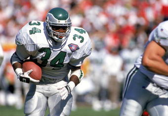 SAN FRANCISCO - OCTOBER 2:  Running back Herschel Walker #34 of the Philadelphia Eagles rushes for yards during a game against the San Francisco 49ers at Candlestick Park on October 2, 1994 in San Francisco, California.  The Eagles won 40-8.  (Photo by George Rose/Getty Images)
