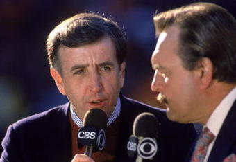 SAN FRANCISCO - JANUARY 1: Newscasters Brent Musberger and Dick Butkus broadcast 'NFL Today' during the 1988 NFC Divisional Playoffs game with the Minnesota Vikings against the San Francisco 49ers at Candlestick Park on January 1, 1989 in San Francisco, California. The 49ers won 34-9. (Photo by George Rose/Getty Images)