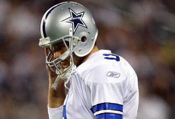 ARLINGTON, TX - SEPTEMBER 20:  Quarterback Tony Romo #9 of the Dallas Cowboys walks off the field during play against the New York Giants at Cowboys Stadium on September 20, 2009 in Arlington, Texas.  (Photo by Ronald Martinez/Getty Images)