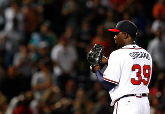 ATLANTA - AUGUST 22:  Closing pitcher Rafael Soriano #39 of the Atlanta Braves pitches in the ninth inning against the Florida Marlins on August 22, 2009 at Turner Field in Atlanta, Georgia.  (Photo by Kevin C. Cox/Getty Images)