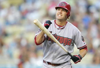 LOS ANGELES - JULY 31:   Mark Reynolds #27 of the Arizona Diamondbacks reacts while at bat against the Los Angeles Dodgers at Dodger Stadium on July 31, 2008 in Los Angeles, California.  (Photo by Lisa Blumenfeld/Getty Images)