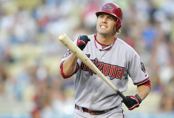 LOS ANGELES - JULY 31:   Mark Reynolds #27 of the Arizona Diamondbacks reacts while at bat against the Los Angeles Dodgers at Dodger Stadium on July 31, 2008 in Los Angeles, California.  (Photo by Lisa Blumenfeld/Getty Images)