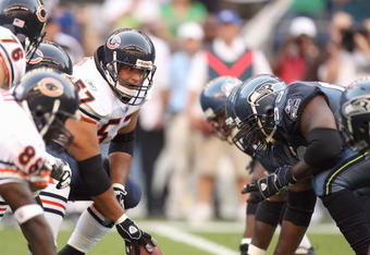 SEATTLE - AUGUST 16:  Center Olin Kreutz #57 of the Chicago Bears gets ready to hike the ball during the game against the Seattle Seahawks at Qwest Field on August 16, 2008 in Seattle, Washington. The Seahawks defeated the Bears 29-26. (Photo by Otto Greule Jr/Getty Images)
