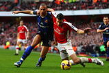 LONDON - FEBRUARY 21:  Anton Ferdinand of Sunderland is challenged by Robin Van Persie of Arsenal during the Barclays Premier League match between Arsenal and Sunderland at Emirates Stadium on February 21, 2009 in London, England.  (Photo by Phil Cole/Getty Images)