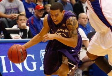 LAWRENCE, KS - JANUARY 13:  Denis Clemente #21 of the Kansas State Wildcats dribbles the ball to the basket during the game against the Kansas Jayhawks on January 13, 2009 at Allen Fieldhouse in Lawrence, Kansas. The Jayhawks defeated the Wildcats 87-71. (Photo by Jamie Squire/Getty Images)