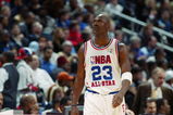 ATLANTA - FEBRUARY 9:  Michael Jordan (Washington Wizards) #23 of the Eastern Conference All-Stars looks on at the 2003 NBA All-Star Game on February 9, 2003 at Philips Arena in Atlanta, Georgia.  NOTE TO USER:  User expressly acknowledges and agrees that, by downloading and or using this photograph, user is consenting to the terms and conditions of the Getty Images license agreement. (Photo by Jamie Squire/Getty Images)
