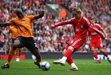 LIVERPOOL, ENGLAND - SEPTEMBER 26:   Fernando Torres of Liverpool scores the opening goal during the Barclays Premier League match between Liverpool and Hull City at Anfield on September 26, 2009 in Liverpool, England. (Photo by Clive Brunskill/Getty Images)