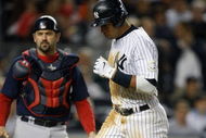 NEW YORK - SEPTEMBER 25: Alex Rodriguez #13 of the New York Yankees trots into home plate to score against the Boston Red Sox during the game on September 25, 2009 at Yankee Stadium in the Bronx borough of New York City. (Photo by Jared Wickerham/Getty Images)