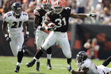 CLEVELAND - SEPTEMBER 30:  Jamal Lewis #31 of the Cleveland Browns gains a first down as he steps through the tackle attempt of Dawan Landry #26 of the Baltimore Ravens as Landry's teammate Chris McAlister #21 follows the play during the second quarter at Cleveland Browns Stadium September 30, 2007 in Cleveland, Ohio.  (Photo by David Maxwell/Getty Images)