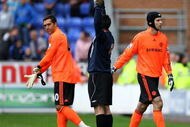 WIGAN, ENGLAND - SEPTEMBER 26: Petr Cech (R) of Chelsea is sent off and changes with Henrique Hilario during the Barclays Premier League match between Wigan Athletic and Chelseaat DW Stadium on September 26, 2009 in Wigan, England. (Photo by Phil Cole/Getty Images)