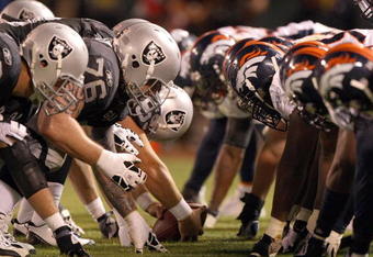 OAKLAND, CA - SEPTEMBER 8:  The Denver Broncos defense line up against the Oakland Raiders offense during the NFL game against the Oakland Raiders on September 8, 2008 at McAfee Coliseum in Oakland, California. The Broncos defeated the Raiders 41-14. (Photo by Jed Jacobsohn/Getty Images)