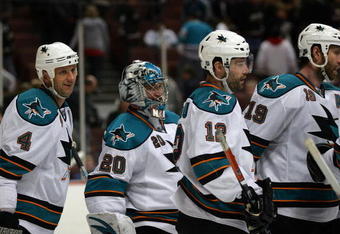 ANAHEIM, CA - MARCH 15:  Rob Blake #4, goaltender Evgeni Nabokov #20, Patrick Marleau #12 and Joe Thornton #19 of the San Jose Sharks skate to the bench after defeating the Anaheim Ducks 1-0 in their NHL game at Honda Center on March 15, 2009 in Anaheim, California. The Sharks shutout the Ducks 1-0.  (Photo by Victor Decolongon/Getty Images)